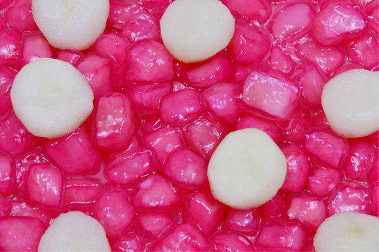 Mock pomegranate seeds is Thailand dessert made by waternut and tapioca flour.
its look like a jelly  eat with coconut milk or syrup.
