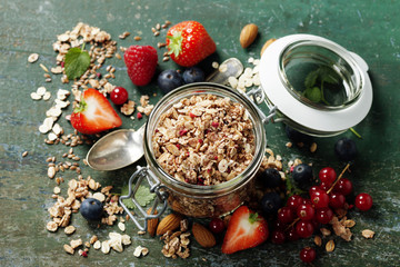 Healthy breakfast of muesli, berries with yogurt and seeds