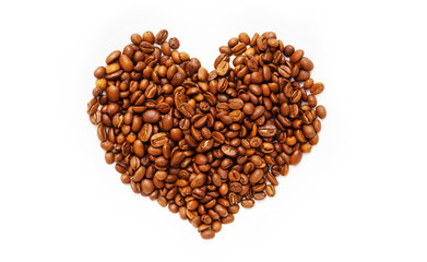 roasted coffee beans in the shape of a heart on a white background