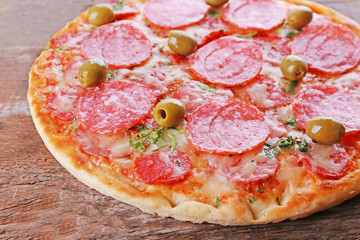 Delicious tasty pizza, closeup