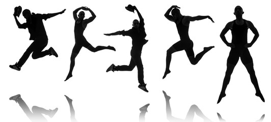 Silhouettes of dancers in dancing concept