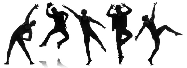 Silhouettes of dancers in dancing concept