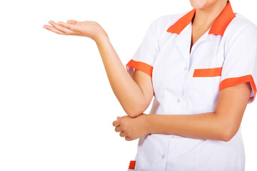 Smiling female doctor or nurse pointing at something