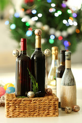 Wine in wicker box and Christmas decor in a room