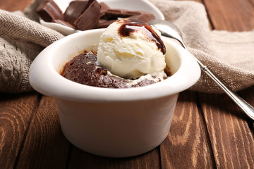 Served table of chocolate lava cake with ice-cream