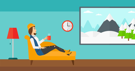 Woman lying with cup of tea.