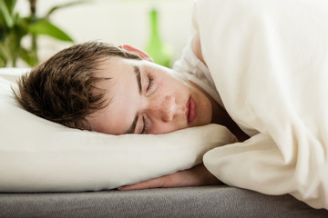 Young boy enjoying a peaceful sleep