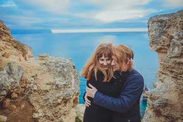 couple in love relaxing, mountain Coast