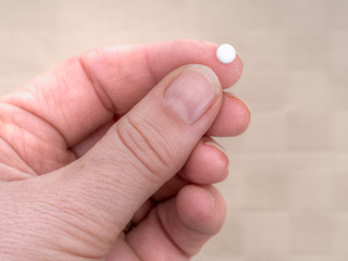One small pill - health, medicine etc. Modern treatments.