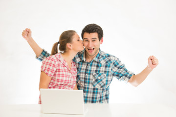 young couple with laptop