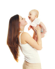 Happy smiling mother and baby playing on white background