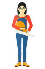 Fototapeta premium Engineer with hard hat and blueprint.