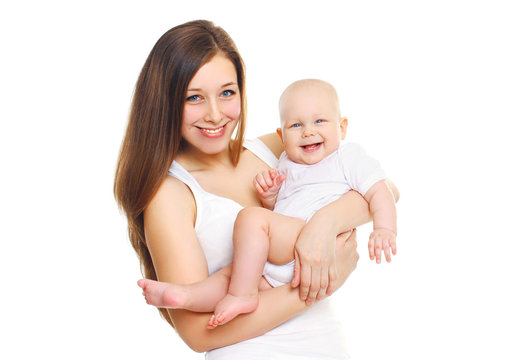 Happy smiling mother playing with baby on white background
