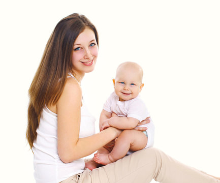 Happy young mother and baby on a white background