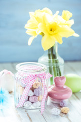 Fresh flowers and easter decoration on table