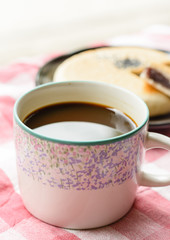 Coffee cup and bread