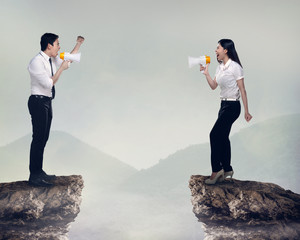 Asian business man and woman shout each other