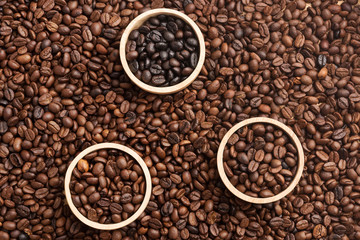 Various types of Coffee Beans in the wooden bolw, coffee bean background