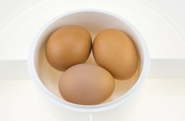 Eggs in white plastic plate