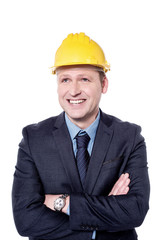 Smiling architect wearing a hardhat