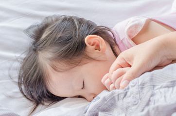 Fototapeta na wymiar Closeup girl sleep after breast feeding