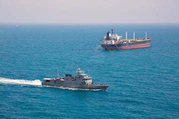 oil tanker near battle ship © namning