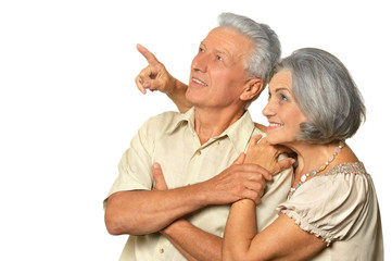 Elderly couple pointing