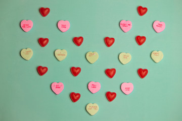 Valentine's Day Red Gummy and  Conversation Hearts on Green Back