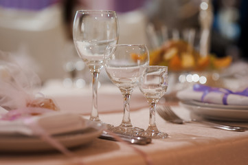 Wedding glasses filled with champagne at the banquet