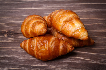 croissants on a wooden background