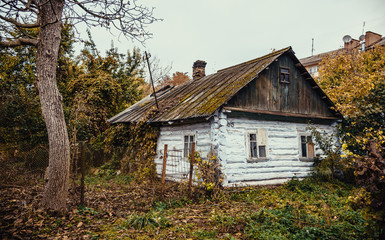 The thrown old wooden house in the city