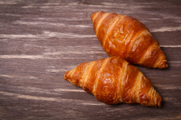 croissants on a wooden background