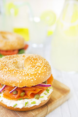 Bagel with salmon and cream cheese, brightly lit