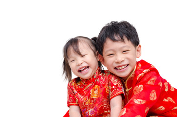 Chinese children in traditional costume smile over white