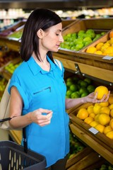 Portrait of a smiling woman with a basket