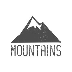 Hand drawn mountain badge. Wilderness old style typography label. Letterpress Print Rubber Stamp Effect. Retro mountain logo design. vector Inspirational vintage hipster brand design.