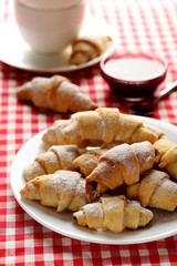 Fresh homemade croissants on a red napkin
