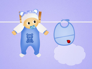 baby male and blue bib