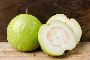 Fresh guava (tropical fruit) on wooden background