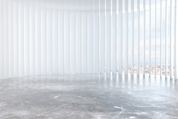 Contemporary white room with concrete floor