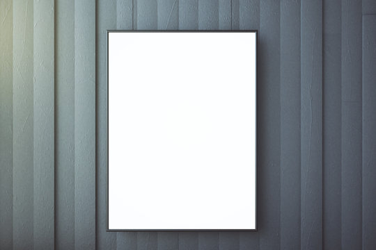 Blank picture frame on a concrete wall, mock up