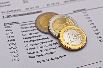 Betriebskostenabrechnung und Münzen