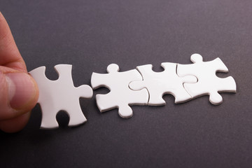 Obraz premium Missing jigsaw puzzle pieces. Business concept. Compliting final task