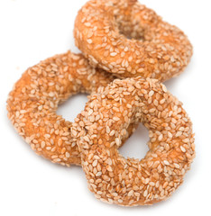 cookies with sesame seeds on a white background