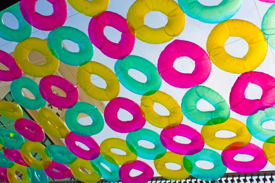 The image "Colorful balloons floating on the ceiling of a party in vintage