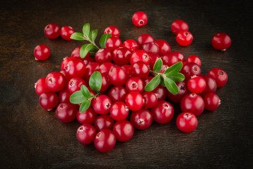 Organic cranberries with leaves.