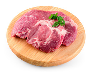 Fresh raw meat on wooden cutting board. With clipping path.