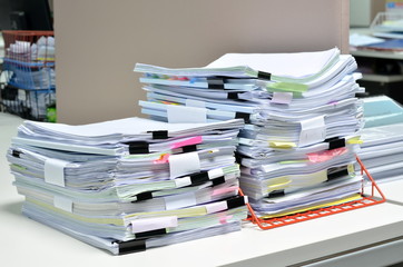 Pile of documents at workplace