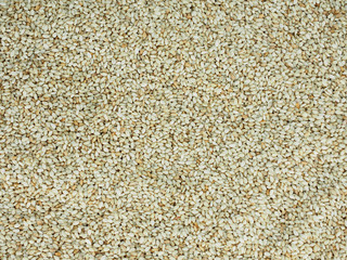White sesame seeds background