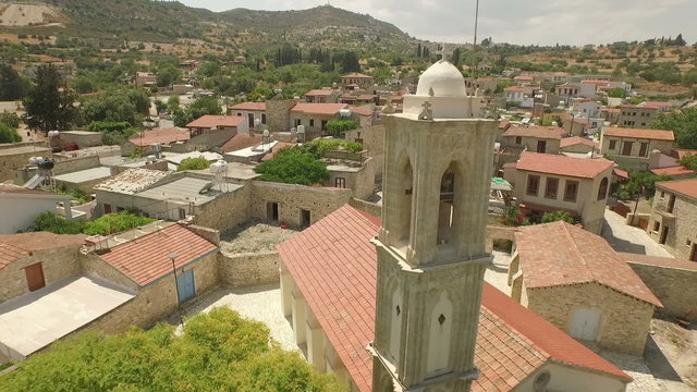 Revealing aerial shot of a church in Cyprus 
